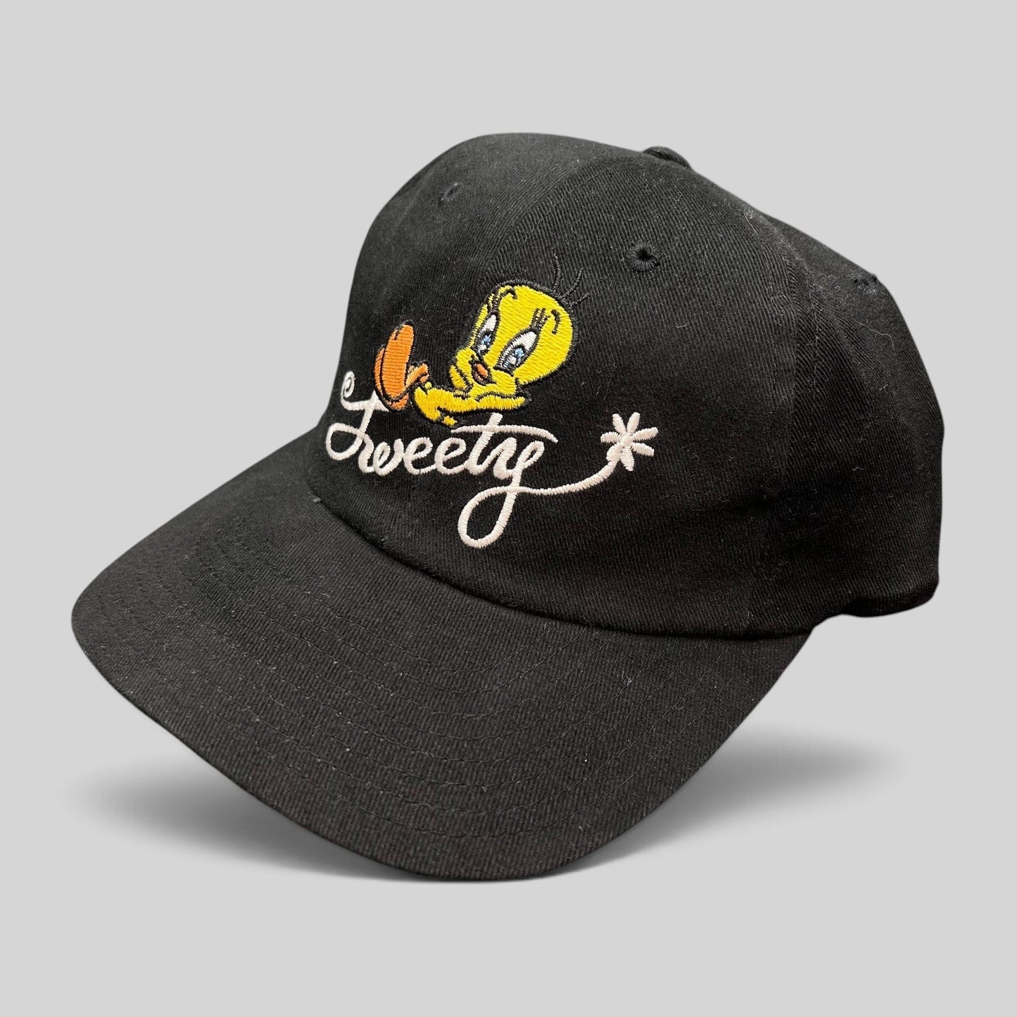 Raree Finds vintage 1998 Warner Bros Studio Store black cotton strapback hat with embroidered Tweety Bird logo