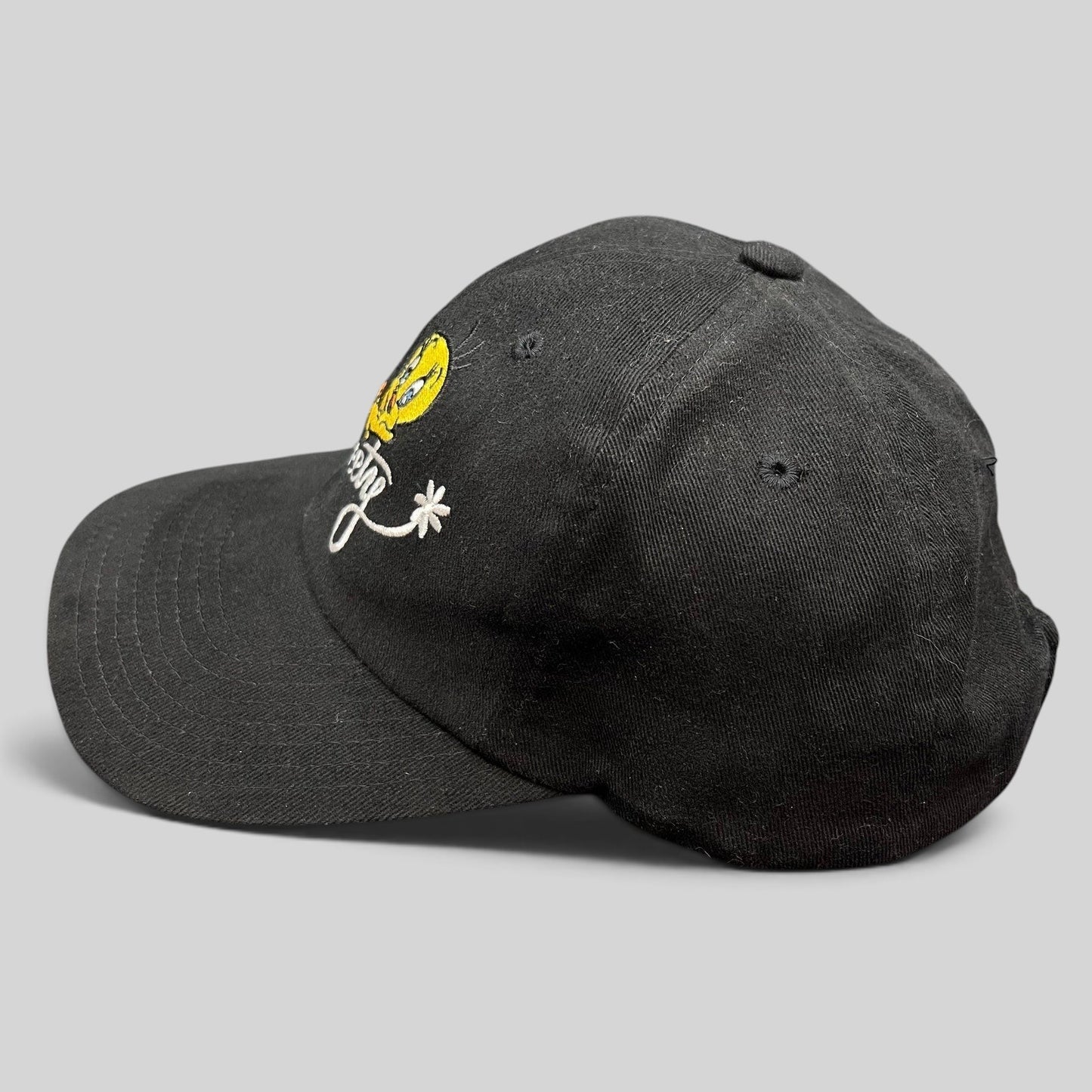 Raree Finds vintage 1998 black cotton strapback hat with embroidered Tweety Bird and scripted logo