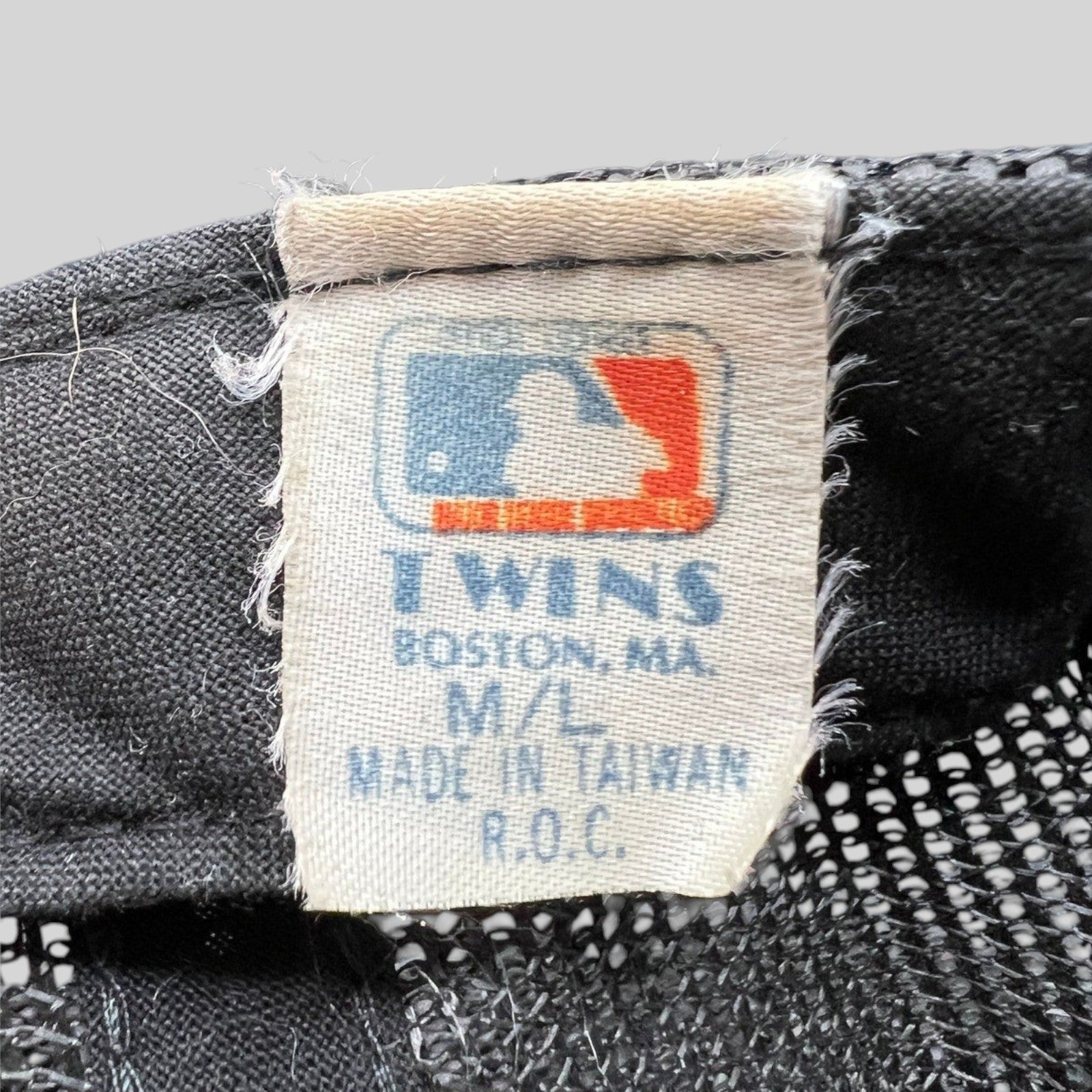 Raree Finds vintage 1980s Twins Enterprise tag on a Baltimore Orioles mesh snapback hat made in Taiwan R.O.C.