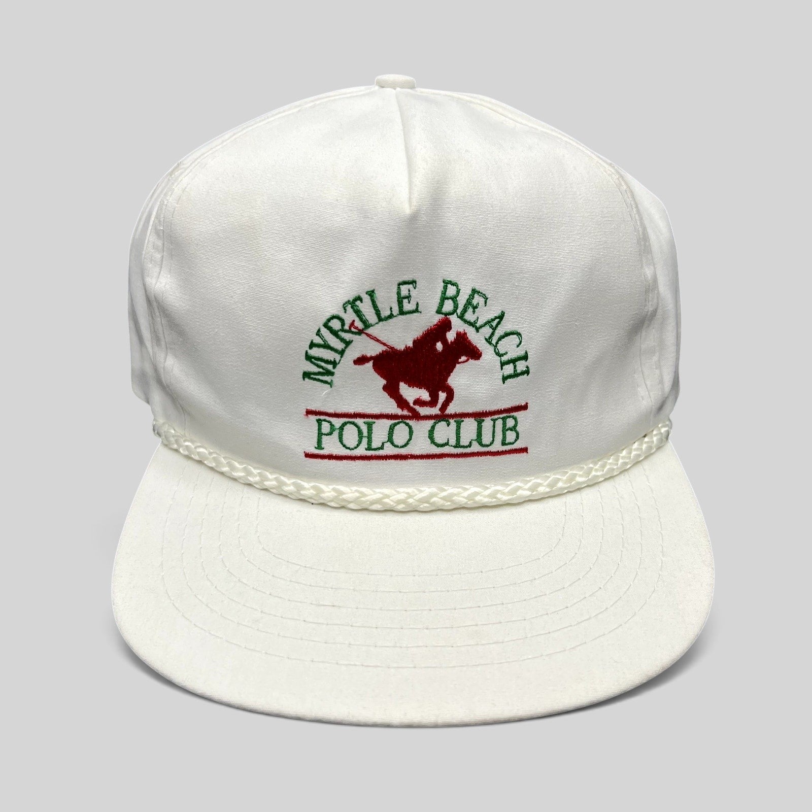 Raree Finds vintage white Myrtle Beach Polo Club rope trucker hat with red and green embroidered horse logo.
