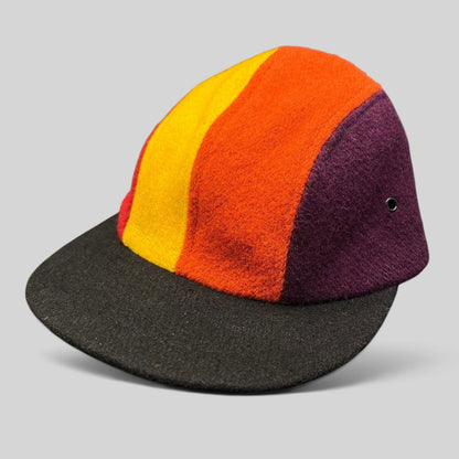 Raree Finds vintage 1980s New York Hat Co wool fitted cap featuring a multi-color block design and black brim.