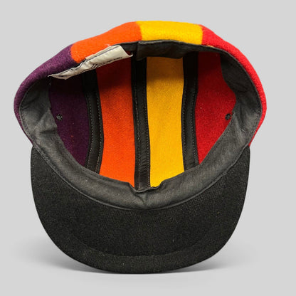 Raree Finds vintage 1980s New York Hat Co wool fitted cap featuring a multi-color block design and black brim.