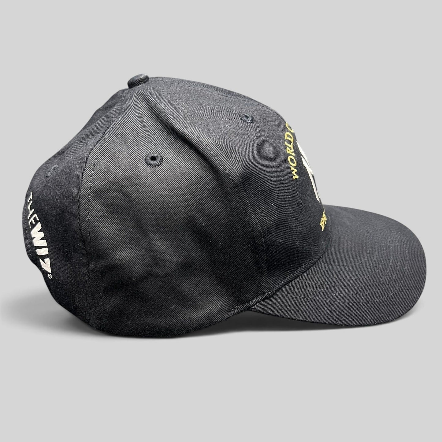 Raree Finds vintage black New York Yankees 3-peat World Champions snapback hat with gold and white embroidery.