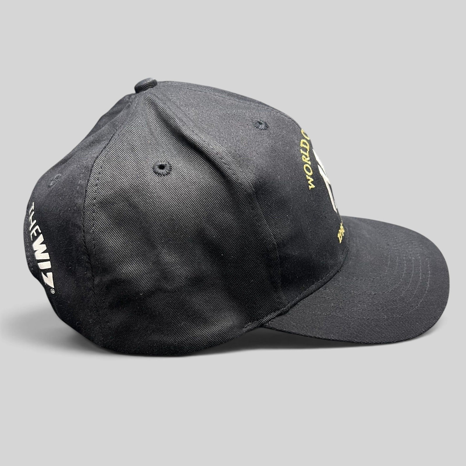 Raree Finds vintage black New York Yankees 3-peat World Champions snapback hat with gold and white embroidery.