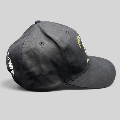 Raree Finds vintage black New York Yankees 3-peat World Champions snapback hat with gold and white embroidery.