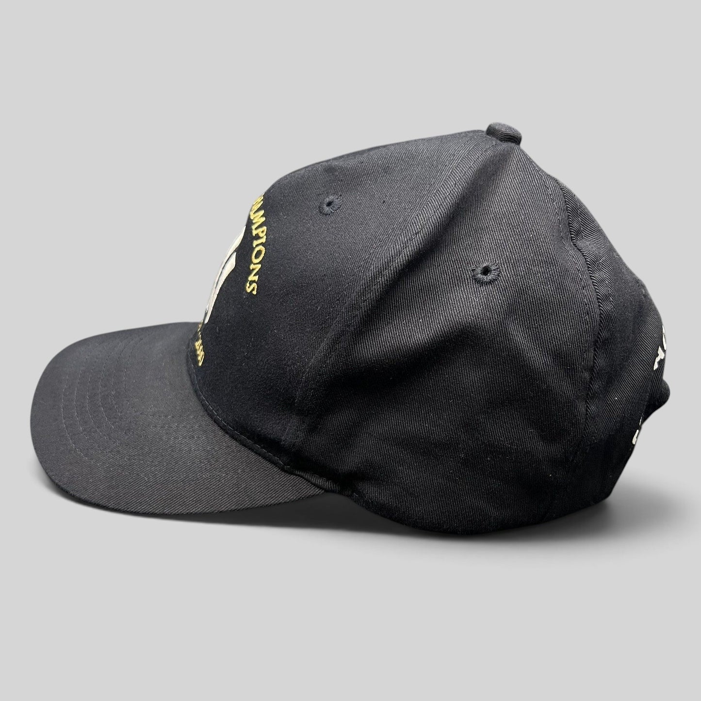Raree Finds vintage black New York Yankees 3-peat World Champions snapback hat with gold and white embroidery