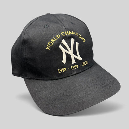 Raree Finds vintage black New York Yankees 3-peat World Champions snapback hat with white and gold embroidery