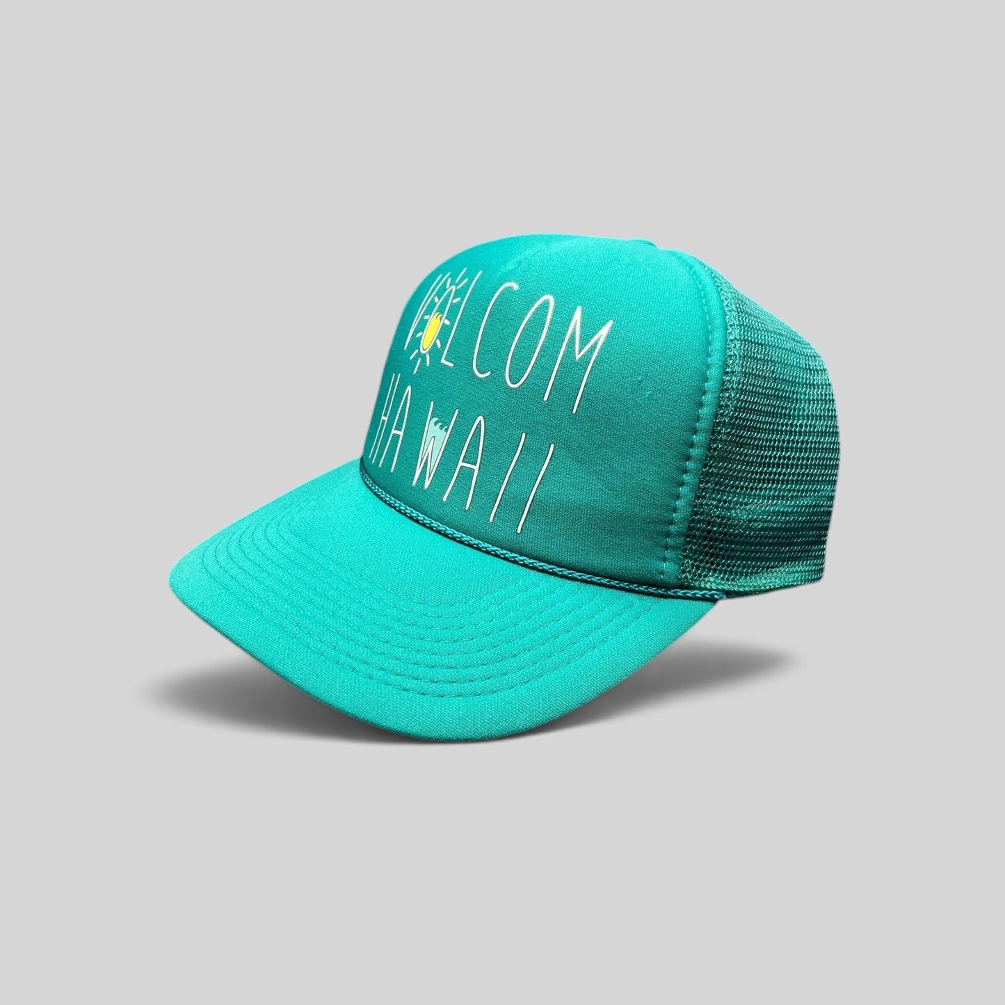 Raree Finds Volcom Hawaii teal mesh trucker hat with foam front, rope detail, and surf-inspired graphic.