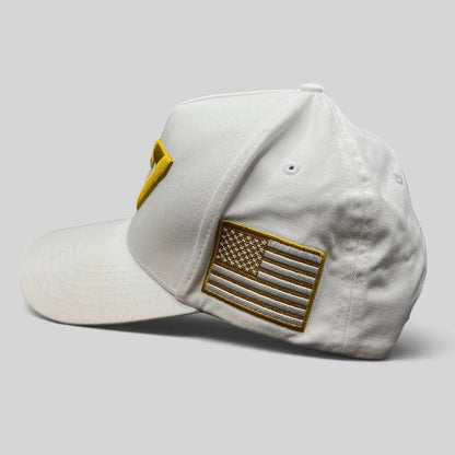 Raree Finds white cotton snapback hat featuring a gold embroidered American flag patch on the side panel.