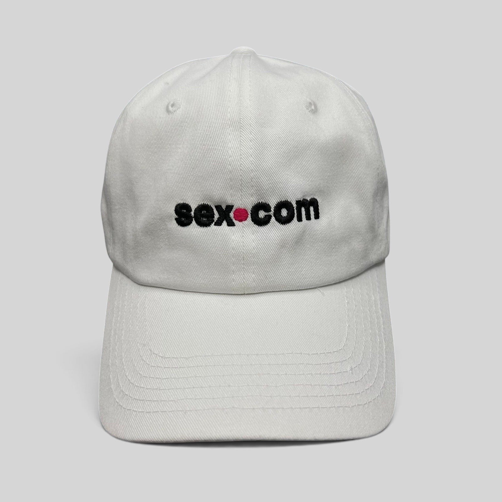Raree Finds white cotton dad cap featuring embroidered sex.com logo with red accent and adjustable brass strapback