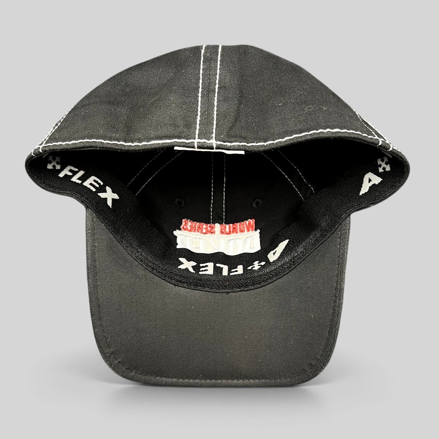 Raree Finds 2010 WSOP flexfit hat in black with white contrast stitching and interior branded sweatband detail