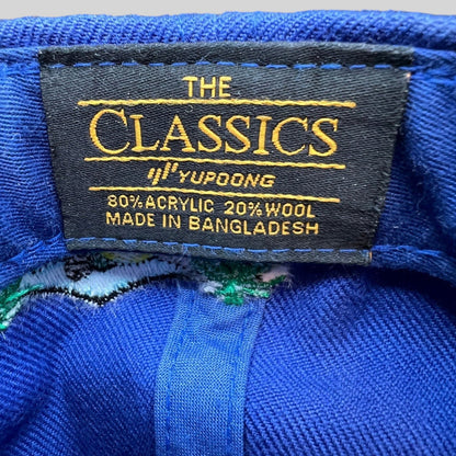 Raree Finds The Classics by Yupoong royal blue snapback interior tag showing material and origin details