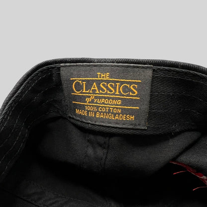 Raree Finds Yupoong The Classics black cotton hat interior tag with brand and material details